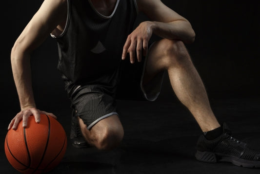male-athlete-with-basketball-posing